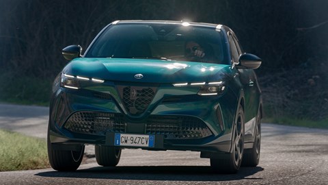 Alfa Romeo Junior Ibrida (2025) review: front three quarter cornering, low angle, blue paint