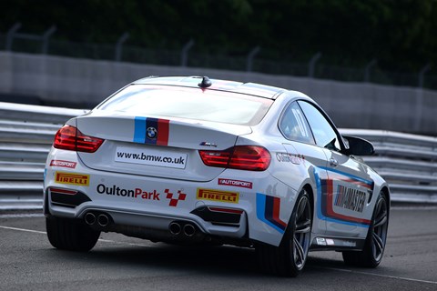 BMW M4 racing driver experience rear quarter