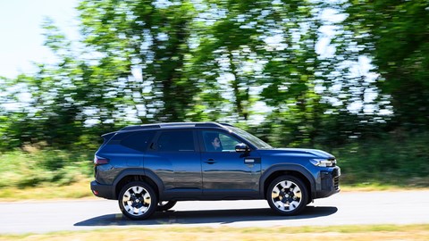 Dacia Bigster (2025) review: side view driving, blue paint, long distance