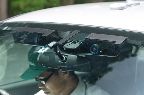 Sensors festoon the windshield of this prototype driverless Honda