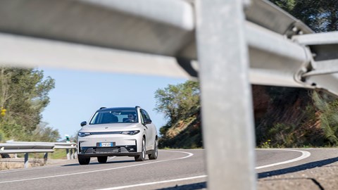 Leapmotor C10 REEV (2025) review: front three quarter cornering, through armco, grey paint