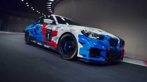 Image of a BMW M2 Racing, in BMW Motorsport livery, viewed from the front right corner