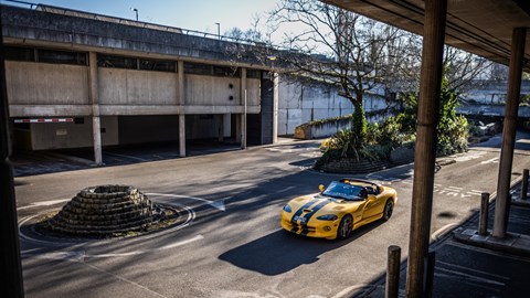 Long-range view of the Dodge Viper RT/10, in yellow, from the front left corner