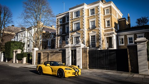 Long-range view of the Dodge Viper RT/10, in yellow, from the front right corner
