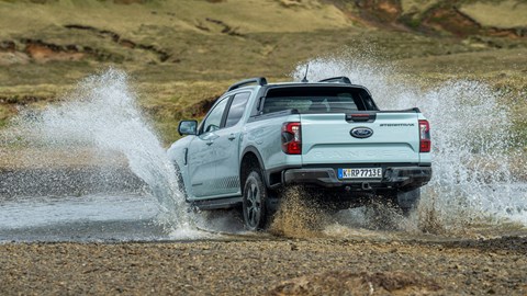 Ford Ranger PHEV review - Stormtrak, grey, rear, splashing through river