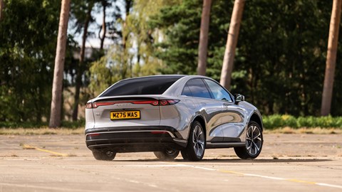 Mazda 6e (2026) review: front three quarter cornering, grey paint