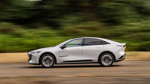 Mazda 6e (2026) review: side view driving, grey paint