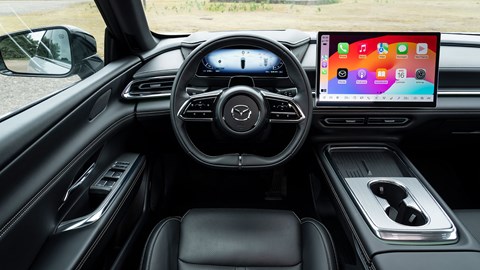 Mazda 6e (2026) review: steering wheel, black faux leather upholstery