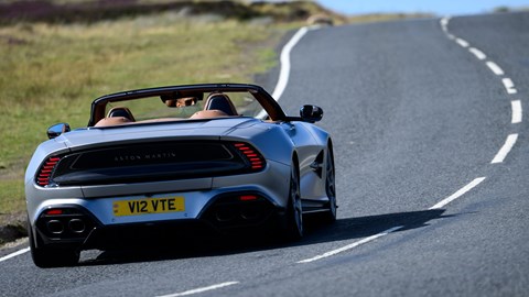 Aston Martin Vanquish Volante review - rear, silver, driving round corner