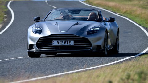 Aston Martin Vanquish Volante review - front, silver, driving round corner
