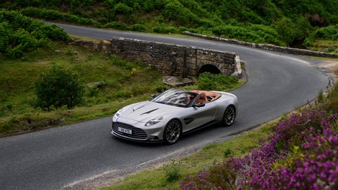Aston Martin Vanquish Volante review - top, silver, driving round corner