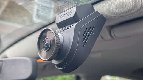 Viofo dash cam mounted to the windscreen
