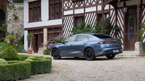 BYD Seal 6 DM-i saloon (2025) review: rear three quarter static, blue paint