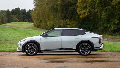Kia EV4 Fastback (2025) review: side view static, green paint