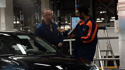 Curtis and Hans in the factory