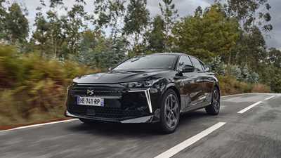 DS No.4 (2025) review: front three quarter driving, through a forest, low angle, black paint