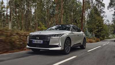 DS No.4 E-Tense (2025) review: front three quarter driving, silver paint, low angle