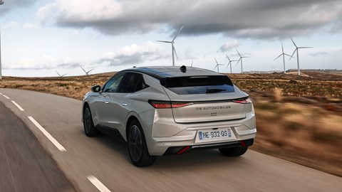 DS No.4 E-Tense (2025) review: rear three quarter driving, silver paint