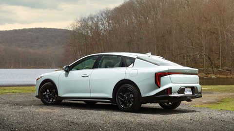 Kia K4 saloon rear three-quarter static