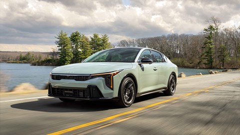 Kia K4 saloon front three-quarter driving