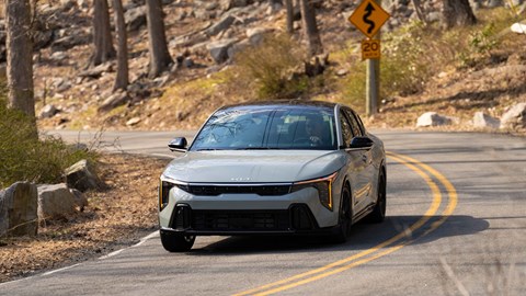 Kia K4 saloon front three-quarter driving