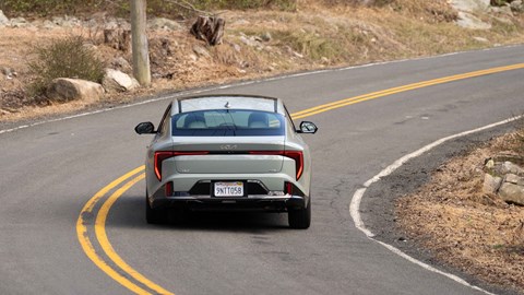 Kia K4 saloon rear driving