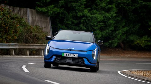 Kia EV4 (2025) review: front three quarter cornering, blue paint