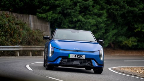 Kia EV4 (2025) review: front three quarter cornering, blue paint, low angle