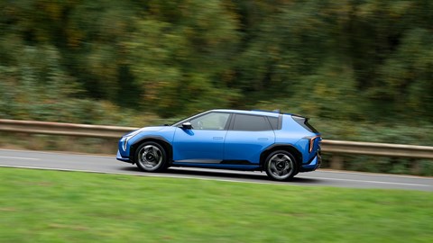 Kia EV4 (2025) review: side view driving, blue paint