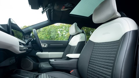 Kia EV4 (2025) review: front seats, grey and white upholstery