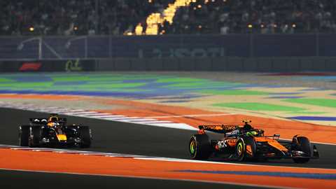 McLaren and Red Bull F1 cars on circuit