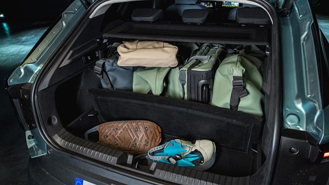 Dacia Striker (2026): boot space, loaded with luggage, showing boot boards