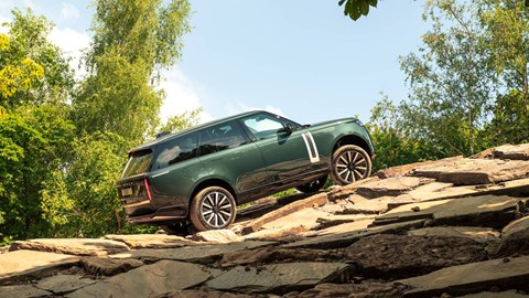Range Rover Electric (2026): rear three quarter off-roading, green paint