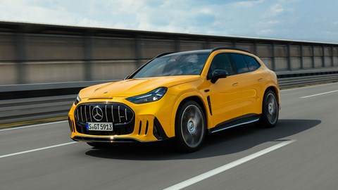 Mercedes-AMG GT SUV (2026): front three quarter driving, yellow paint