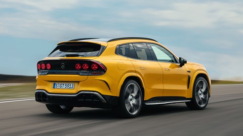 Mercedes-AMG GT SUV (2026): rear three quarter driving, yellow paint
