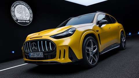 Mercedes-AMG GT SUV (2026): front three quarter static, yellow paint, studio shoot