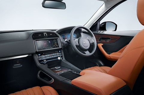 The F-pace cockpit receives the updated touchscreen infotainment system