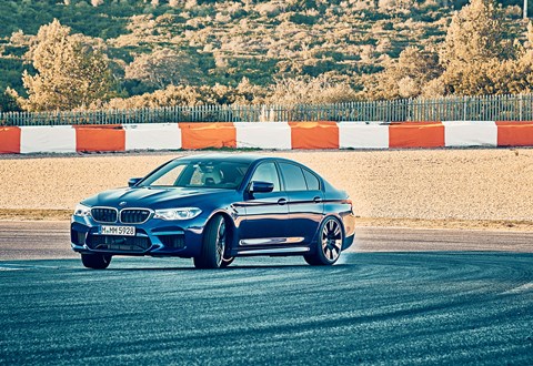 BMW M5 in drift mode on track: photographed for CAR magazine