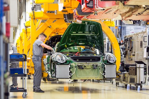 A Porsche 911 is finished at the Stuttgart factory. One in eight Porsches is still a 911