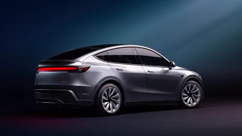 2025 Tesla Model Y, rear three quarters