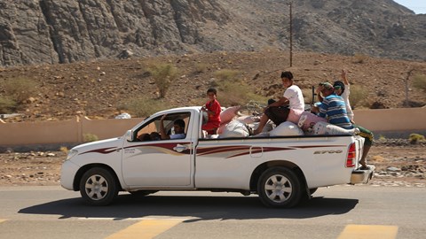 Local Omani Toyota Hilux loaded with goods - and people