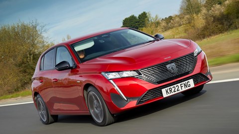 Best hybrids: Peugeot 308, red, front view, driving through countryside