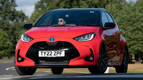 Best hybrids: Toyota Yaris, red, front view, driving