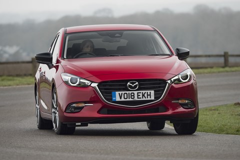 The outgoing 2018 Mazda 3 hatchback in the UK