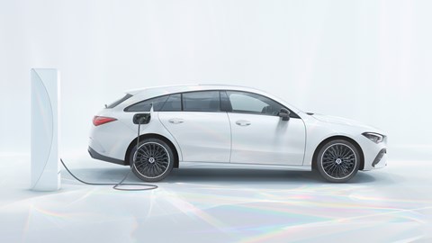 Mercedes CLA 2023 facelift: Shooting Brake side, white car, studio background, plugged in charging