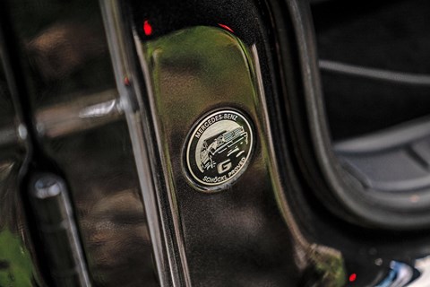 Schockl proved sign on the Mercedes G-Wagen's B-pillar