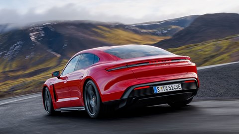 Porsche Taycan GTS facelift: rear three quarter driving, red paint