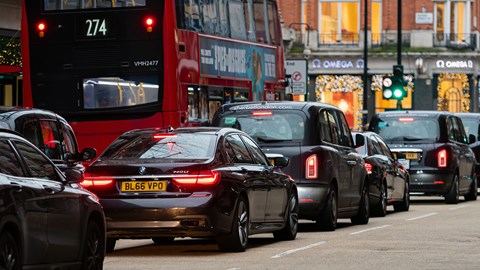 London traffic, rear three quarter view, busy street