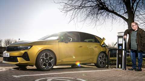 Vauxhall Astra PHEV plugged in charging, yellow car