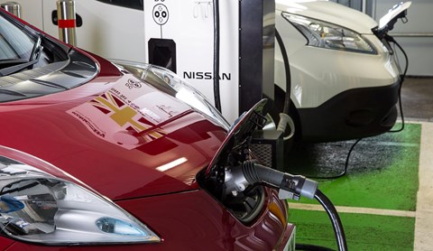 Electric cars charging at a public point